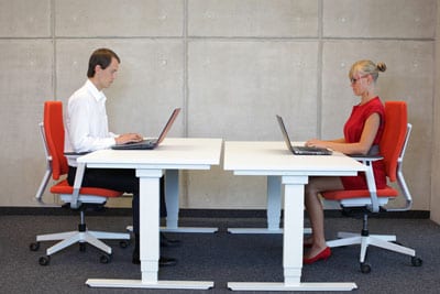 Adjustable desks in an office